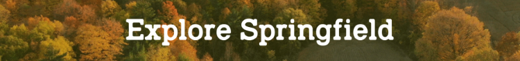 "Explore Springfield" displayed in white across a background of New England trees.
