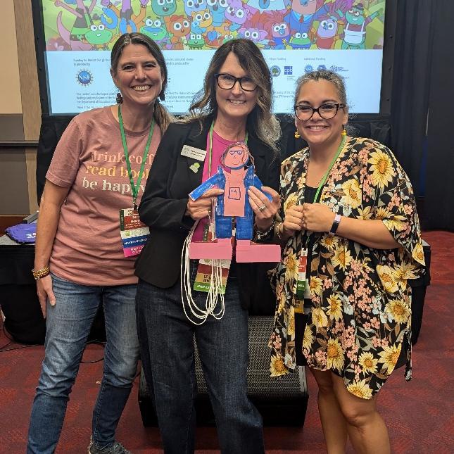 Three smiling ARSL conference attendees.