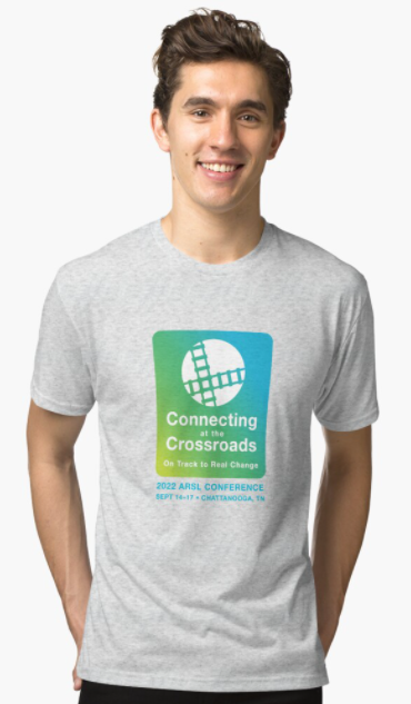 Person wearing a light grey ARSL 2022 conference logo t-shirt.