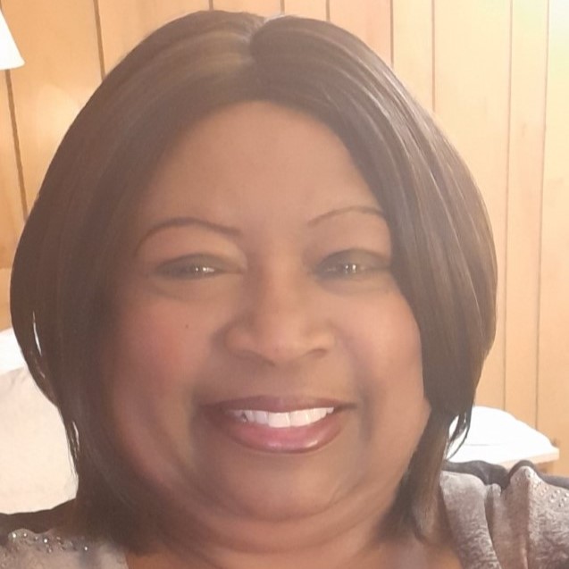 Headshot of Angela Watkins.