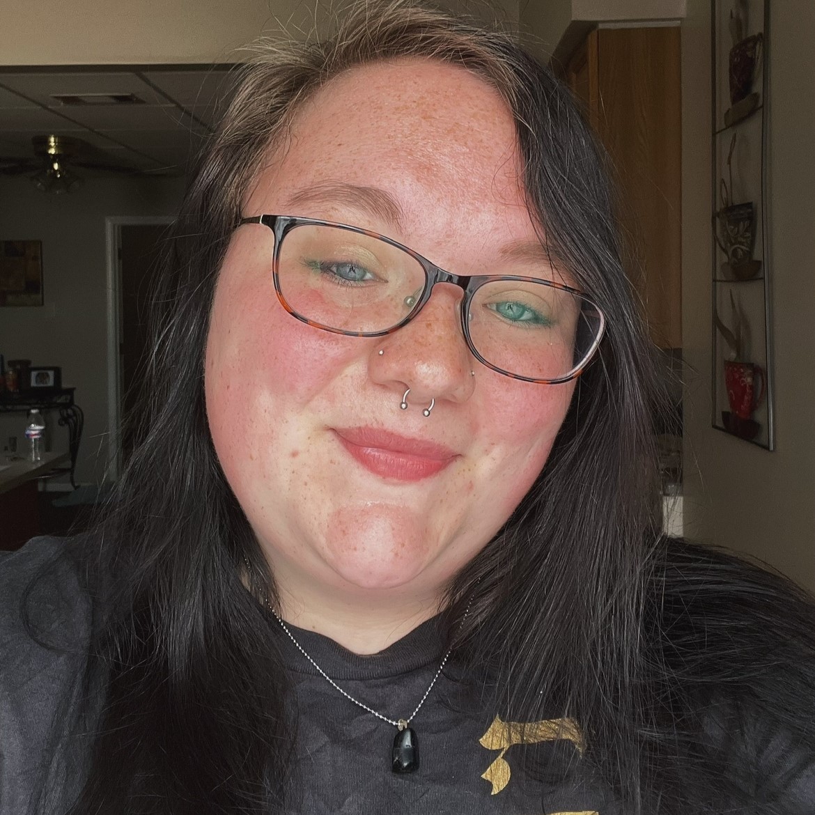 Headshot of Emily Nicole Ott.