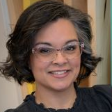 Headshot of Maggie Moore.