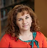 Headshot of Miriam Adrianne Sisson.