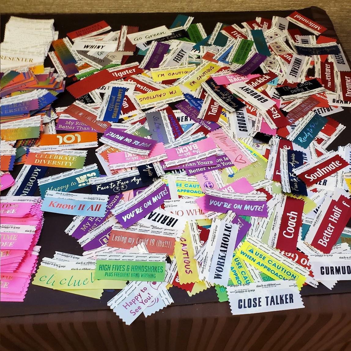 Pile of assorted ARSL conference ribbons.