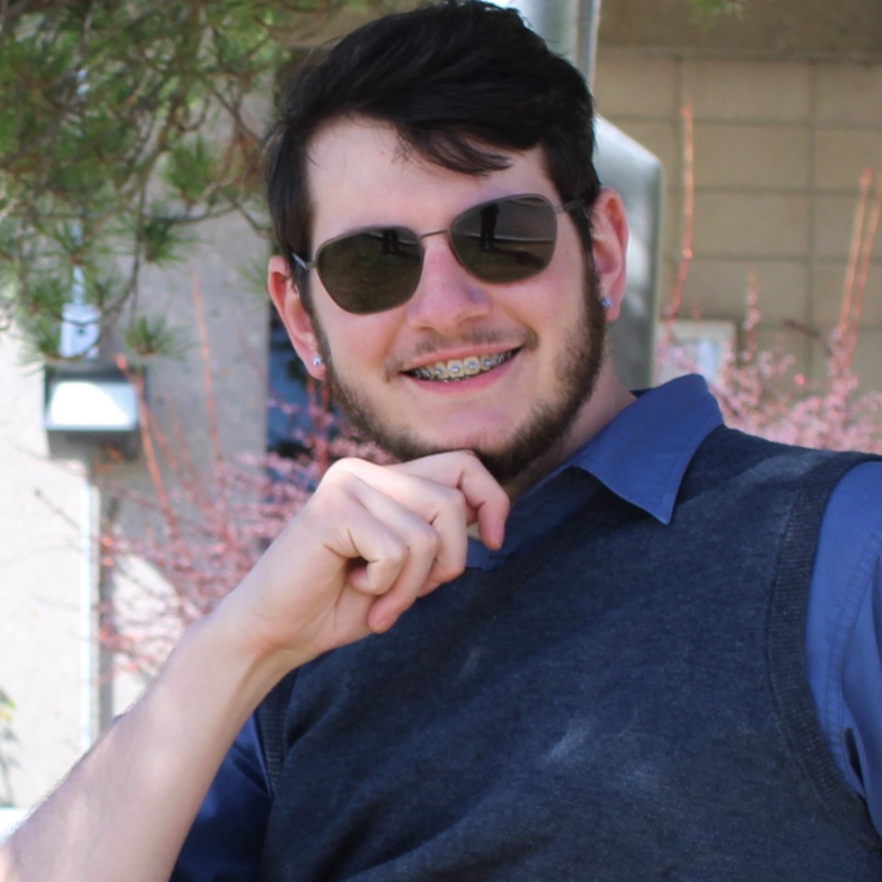 Headshot of Tanner Dominick Ames.